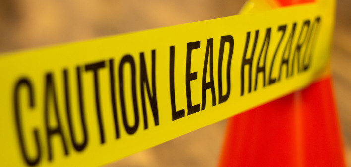 yellow caution tape lead hazard warning