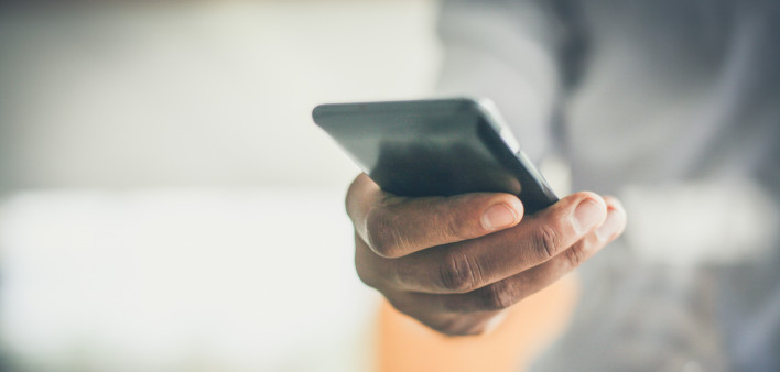 hand holding smart phone