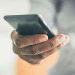 hand holding smart phone