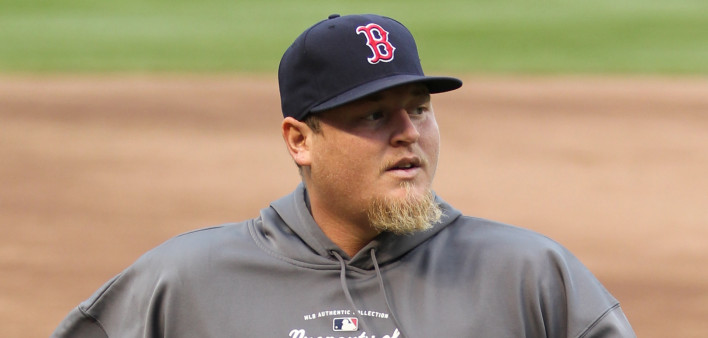 Bobby Jenks pitches with the Boston Red Sox before a game in 2011.