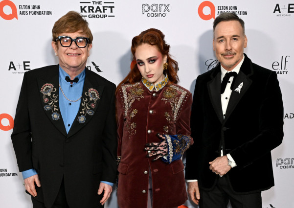 From left: Elton John, Chappell Roan and David Furnish attend the press conference for the Elton John AIDS Foundation’s 33rd Annual Academy Awards Viewing Party on March 2, 2025
