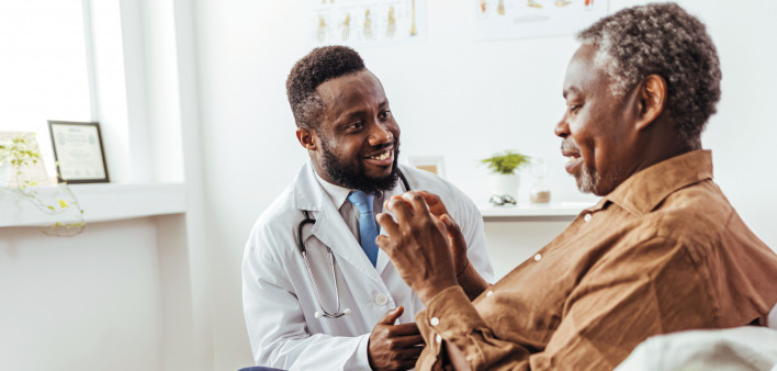Black doctor and black patient consultation