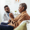 Black doctor and black patient consultation