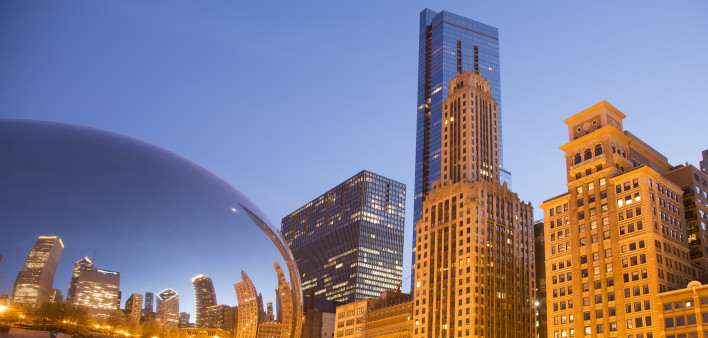 City skyline and reflection in mirror at sunset, Chicago, IL
