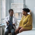 black doctor and black patient consultation