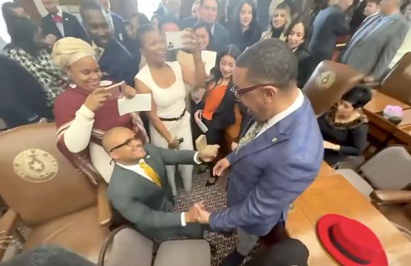 Venton Jones, a state lawmaker in Texas who is HIV positive, proposes to his partner, Gregory  Scott Jr., on the floor of the state House on January 14, 2025.