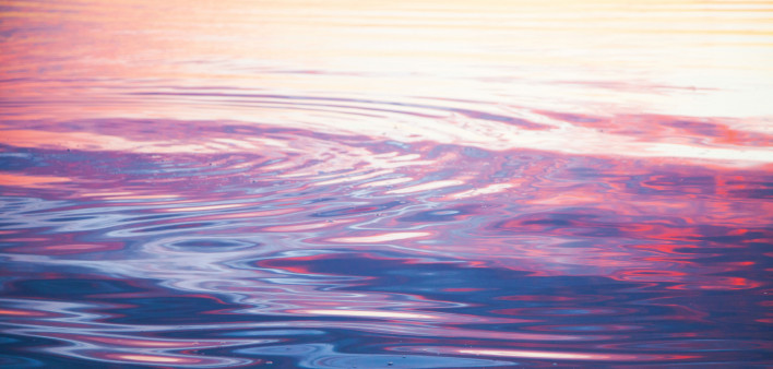 colorful ripples in water reflection
