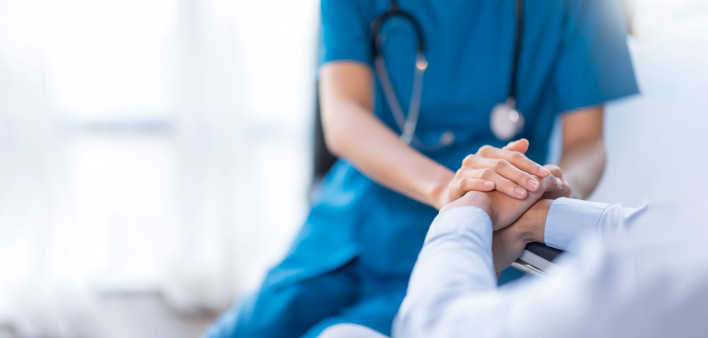 hands of nurse and patient