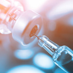 syringe in vial vaccine