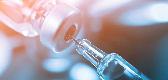 syringe in vial vaccine