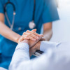 hands of nurse and patient