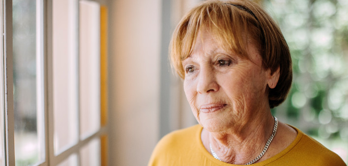 Senior woman in nursing home sad unhappy
