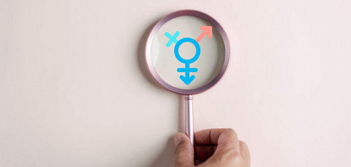 hand maginfying glass gender symbole