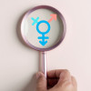 hand maginfying glass gender symbole