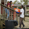 Community organizations offer free food, HIV testing, and other preventive health services at an event in Jackson, Mississippi.