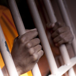 Prison Prisoner Prison Reform hands on bars
