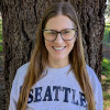 Erin Bremmer poses at Green Lake. Proton therapy helped treat her brain tumor.