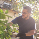 A healthy Latino man living with HIV in the garden