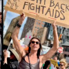 Death by 1,000 Musk Cuts march organized by the AIDS activist group ACT UP