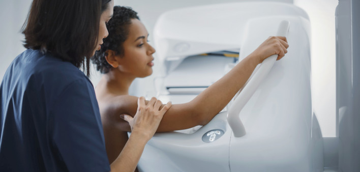 woman getting mammogram
