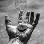 Hand with expiring hourglass with copy space Death, Hourglass, New Life, Horror, Aging Process