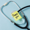 Stethoscope and thank you sticky