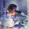 woman researcher in lab microscope