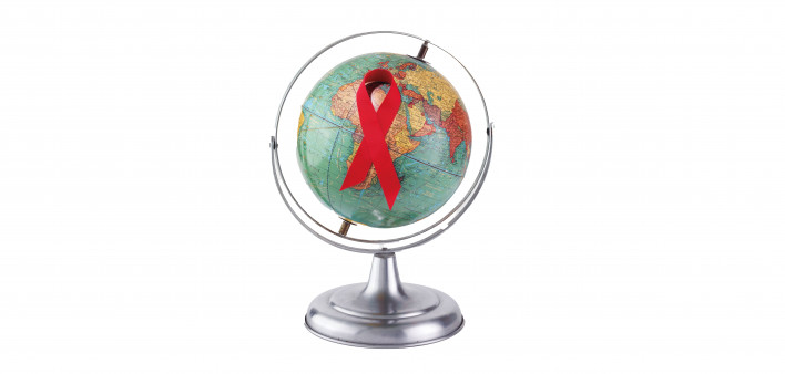 Globe with red ribbon AIDS