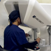 A doctor in Florida uses a robert to perform telesurgery on a patient thousands of miles away.