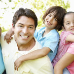 A multi-generational latin family having fun outdoors
