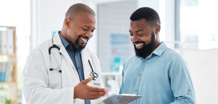 smiling doctor and patient african american