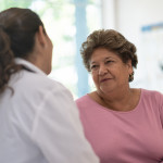 Older Woman talking with the Doctor