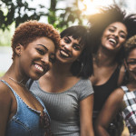 Black women Teenager Girls smiling having fun outdoors