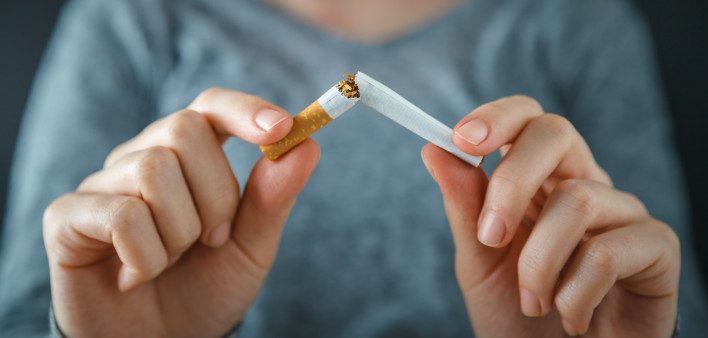 hands break cigarette quite smoking