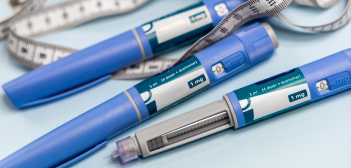 Ozempic Insulin injection pen or insulin cartridge pen for diabetics. Medical equipment for diabetes parients. stock photo Injecting, Semaglutide, Medical Injection, Syringe, Abdomen