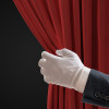 Actor is pulling red curtains in theatre with hand. white glove