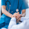 hands of nurse and patient