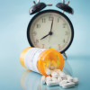 alarm clock and pills medication