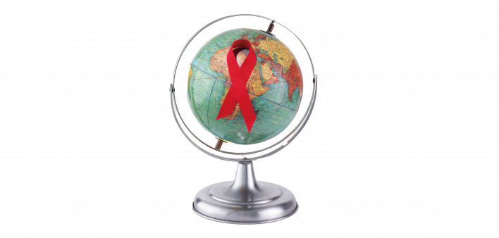 Globe with red ribbon AIDS