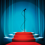 microphone in spotlight center stage
