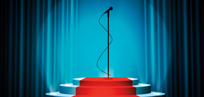microphone in spotlight center stage
