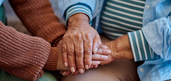 hands together three generations women
