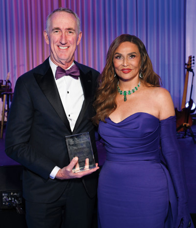 Gilead Sciences chairman and CEO Daniel O’Day with Tina Knowles