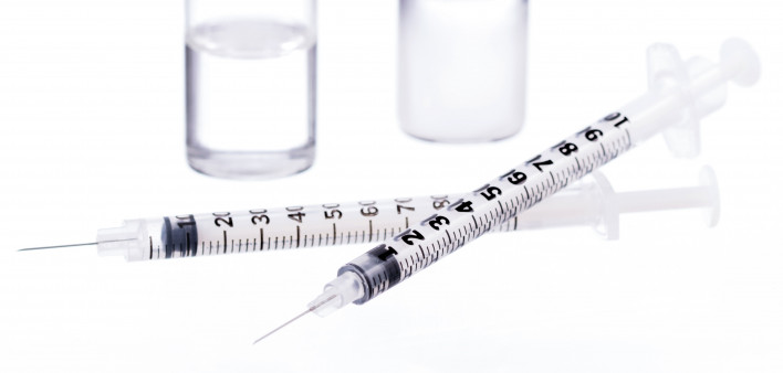 needles and vials vaccine medication