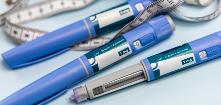 Ozempic Insulin injection pen or insulin cartridge pen for diabetics. Medical equipment for diabetes parients. stock photo Injecting, Semaglutide, Medical Injection, Syringe, Abdomen