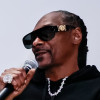 Music icon Snoop Dogg (right) speaks with GLAAD's Darian Aaron at the October 2025 launch of "Generation Z & HIV" at Jackson State University in Mississippi.
