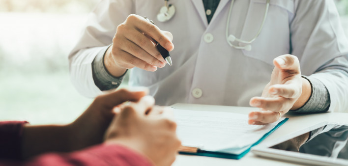 Doctor talking to the patient about menopause and treatment in future.