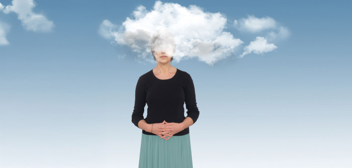 photo illustration woman with her head in the clouds