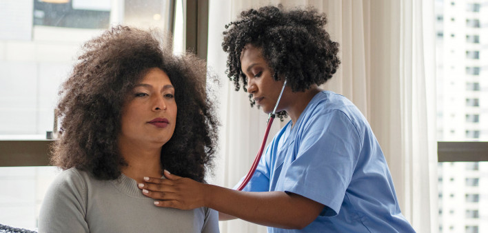 Black Doctor and Patient stethoscope