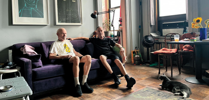 Joe Westmoreland (right) at home with Charles Atlas, his partner, and Vivian, their cat